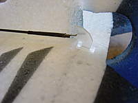 Name: DSC00195.jpg
Views: 668
Size: 43.3 KB
Description: It is important to get the hole on the control horn right over the hinge point to get maximum elevator throw.
