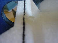 Name: DSC00196.jpg
Views: 584
Size: 27.5 KB
Description: You either need to cut off some of the plastic from the bottom of the elevator horn or clearance some foam so you can get full negative elevator throw.