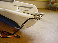 Name: DSC00184.jpg
Views: 905
Size: 66.1 KB
Description: Its a good idea to trial fit the motor in the motor mount before you glue in the mount.  I usually clear the opening of the mount with an exacto to make it easier.