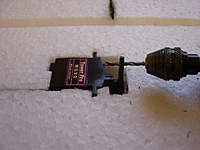 Name: DSC00046.jpg
Views: 417
Size: 48.1 KB
Description: If you use the supplies servos there is one arm supplied that has one long side.  Cut off the rest and then drill out the second hole for the pushrod attachment.  If you use the first hole there is not enough meat on the servo arm.