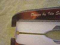 Name: DSC00070.jpg
Views: 337
Size: 72.4 KB
Description: Cut the top slots for the carbon rods that go all the back to the tail and glue in the upper rods.