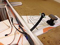 Name: IMG_1165.jpg
Views: 541
Size: 186.4 KB
Description: Put on on doubler and slide the gear through the lasered slot in the fuse right below the Ail servo.
