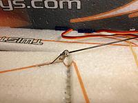 Name: IMG_1182.jpg
Views: 611
Size: 193.1 KB
Description: Put the Z bend in the Ail servo arm end and run the rod through the keeper in the Ail horn side.  Cut off the excess carbon rod and tighten the keeper.