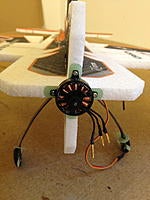 Name: IMG_1204.jpg
Views: 660
Size: 93.4 KB
Description: Use the screws that come with the motor to attach it to the fuse.  Notice all the wires from the servos and motor are on the left side of the plane.