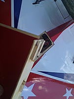 Name: IMG_2773.jpg
Views: 63
Size: 78.9 KB
Description: I replaced the six screws that originally held the hatch in with some latches.  This is the back of the hatch where I have built some tabs that slide into place as you slide in the hatch from the front.