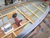 Name: Hartman Tug 2 010.jpg
Views: 697
Size: 107.8 KB
Description: Servo mount, wholemade pushrod and rudderblock. I drilled out an old dumas rudder tiller to 1/4 "
