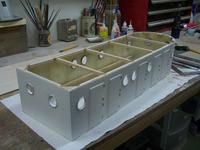 Name: Hartman Tug cabin 002.jpg
Views: 382
Size: 68.5 KB
Description: Port holes are in and primed along with the door hinges. Roof supports installed.