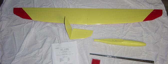 The complete kit contents, including the tail, wing, fuselage (front and back), and other necessary components for completion.