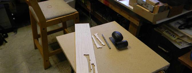 The little able next to my work bench is handy for several things. Here I use it for sanding each sheet.