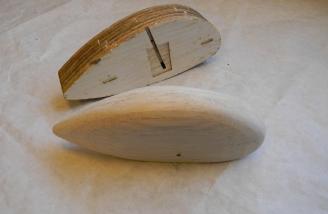 Wheel pants built from layers of balsa and not difficult to sand to shape.