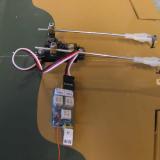 One servo operates the ailerons through torque rods. All necessary hardware is included in the kit.