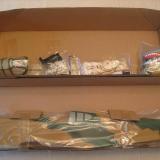 The fuselage and various bagged small parts are packed in the bottom layer.