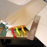 Quite a bit of cutting and fitting is involved in getting the tail of the fuselage fitted. Popsicle sticks are handy tools!