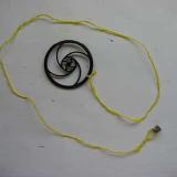 String-weight-wheel tool was needed for hauling servo leads through the twisty passages inside the fuselage.