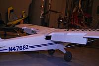 Name: DSC_5326.jpg
Views: 50
Size: 87.0 KB
Description: You can see the foam wedges I am using to hold the flaps in place for testing. Funny, they are bits from the wing tips.