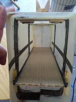 Name: 2013-01-13_09-53-45_396.jpg
Views: 49
Size: 88.3 KB
Description: payload / battery tray.. honeycomb nomex/fiberglass..tray slides into holes in back.