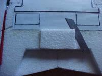 Name: MVC-RW85.jpg
Views: 2189
Size: 26.0 KB
Description: From a scrap of foam, cut a block and fit it over the mount plate like shown and hot glue it to the mount plate and surounding foam.

Take the blade like you did on the servos and shave the foam level with the top of the wing. Sanding may be required to