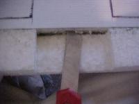 Name: MVC-RW82.jpg
Views: 2322
Size: 21.0 KB
Description: Then I cut from the center of the TE forward making sure the blade is on top of the CF spar. You can cut a little at a time, or if your comfortable just take the block of foam out in one swipe. Remove the block of foam and make sure the CF spar is showing