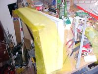 Name: MVC-RWpic6.jpg
Views: 2707
Size: 43.0 KB
Description: Layup the next row, working towards the nose. Keep overlap to a minimum, 1/4"- none is fine.
