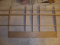 Name: HPIM1386.jpg
Views: 33
Size: 242.1 KB
Description: i used tapered trailing edge stock covering the 3 center ribs and extending to the next rib on each side