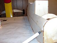 Name: HPIM1472.jpg
Views: 30
Size: 235.0 KB
Description: not a great picture but there is a small gap in the firewall/fuse side.....i'll just fill this in with scrap when i get ready to start the sanding