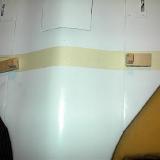 I taped the lower surface and marked for the cutout � the gear should go a little further back than this � and centered the leg slot 50mm behind the CG.