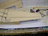 Name: DSCN4400.jpg
Views: 95
Size: 196.8 KB
Description: Tip blocks glued to stab and elevator and rough sanded to shape.
