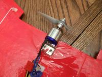 Name: wing5 001.jpg
Views: 112
Size: 80.5 KB
Description: Motor installed on my wing. 100mph setup.