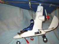 Name: HangGlider008.jpg
Views: 144
Size: 93.8 KB
Description: Here it is,.. "cute" thing. I added the servo & the rudder assy. ad to change the motor thrust to nearly level as seen in the photo.