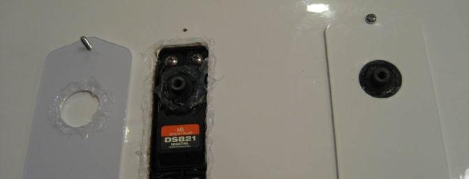 Clear RTV Silicone sealant was used to waterproof the servo openings.