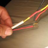 Apply some heat shrink tubing over the motor bullet connectors.