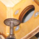Just grind the epoxy around each nut