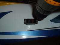 Name: SERVOS 001.jpg
Views: 317
Size: 43.5 KB
Description: I drilled the pilot holes using a 1/16" drill bit.