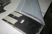 Name: 5.jpg
Views: 241
Size: 44.6 KB
Description: Wing sanded and trailing edges cut off. You can see the hole I melted for the servo wire.