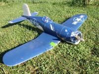 Name: IMG_5794.jpg
Views: 278
Size: 217.0 KB
Description: My corsair after motor mount release 2X's notice the patching from the prop blade going through the wing. Still flys awesome! 