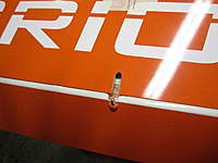 Name: flap horn.jpg.jpg
Views: 775
Size: 39.3 KB
Description: Modified flap horn installed, linkage opening cut.