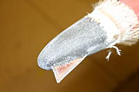 Name: IMG_5293.jpg
Views: 261
Size: 40.9 KB
Description: i am ready to pull the thing off the condom and the fuse, it comes off pretty easy, and what little may stay in the very nose can be released from the epoxy surface.