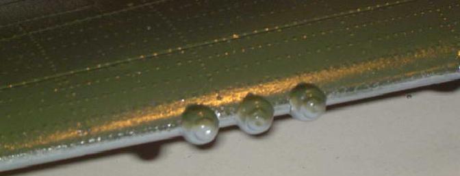  Closeup of the triple machine gun muzzles on one wing, token to the scale detail inherent in this kit