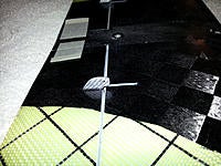 Name: ZoneV2CenterGlassedHorns1c1600.jpg
Views: 32
Size: 259.4 KB
Description: Close up of the right aileron horn and push rod channel.