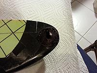 Name: Pegpatch16x12001f.jpg
Views: 22
Size: 243.1 KB
Description: Carbon fiber patch sanded down all the way to grade 2000 wet and dry so it is very smooth, then i used a black sharpie to bring back the shine, job done.