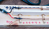 Name: powerbus2_-2.jpg
Views: 74
Size: 58.5 KB
Description: The ends are secured using screw eyes. I used a large nylon control horn (cut down and drilled) to attach the power plug