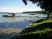 Name: 000_0106.jpg
Views: 19
Size: 304.8 KB
Description: From my neighbors property. My float fly dock is the short one before the long one with the boats and windsock pole.