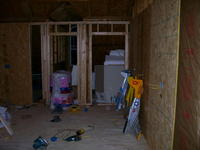 Name: 100_2245.jpg
Views: 610
Size: 84.3 KB
Description: Shot from the other side of the room.  Still have to put the ceiling in and finish insulation.  Another 10 days tops!