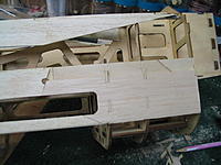 Name: IMG_0183.jpg
Views: 38
Size: 173.7 KB
Description: I installed the balsa sheeting in two sections to make it easier. The lower section is glued in place.