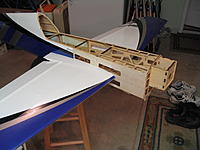 Name: IMG_0187.jpg
Views: 57
Size: 161.1 KB
Description: The right side of the fuse was in worse shape than the left. I final sanded the fuse and fit the wings. I'll sleep good tonight.
