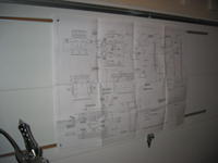 Name: 100-0007_IMG.jpg
Views: 156
Size: 52.3 KB
Description: Cork strips I mounted on the garage door to hold plans up and out of the way.