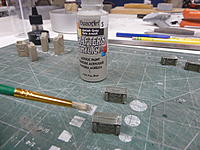 Name: P1010475.jpg
Views: 49
Size: 160.7 KB
Description: Here I dry brush gray on by just dragging the brush across the raised areas only and edges.