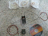 Name: IMG_1628.jpg
Views: 61
Size: 291.9 KB
Description: 3 antenna kits, receiver, remote, (2) remote wires, Install CD....Nice!