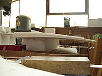 Name: Picture 572.jpg
Views: 499
Size: 58.2 KB
Description: Wing cores are cut, this is why i pre-bent the foam sheets at layering time to get the anhedrial curve i was.