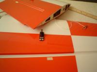 Name: DSC02044.jpg
Views: 807
Size: 35.9 KB
Description: servo installed.. marked and cut covering away for control horn.